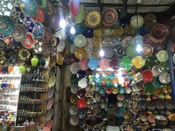 jjc students study abroad in morocco ceramics vendor in Marrakech joliet junior college