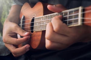 playing ukulele